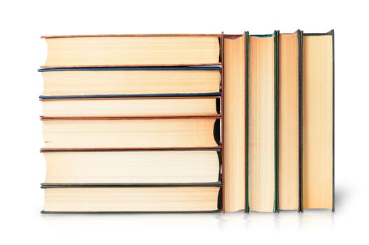 Stacks of old books isolated on white background