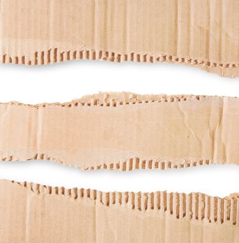 Three Pieces Of Corrugated Cardboard On White Background