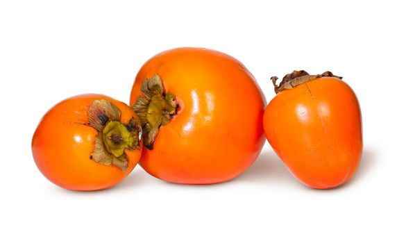 Three Whole Persimmons Isolated On White Background