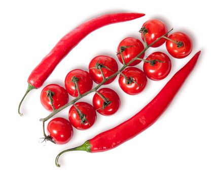 Two chili pepper and cherry tomatoes on stem top view isolated on white background