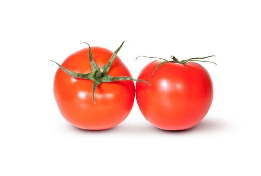 Two Fresh Red Juicy Tomato Isolated On White Background