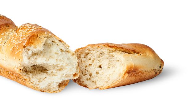 Two fresh French baguette piece isolated on white background