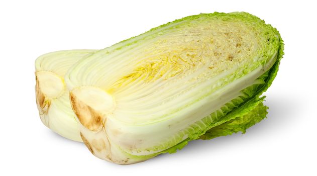Two halves of Chinese cabbage to each other isolated on white background