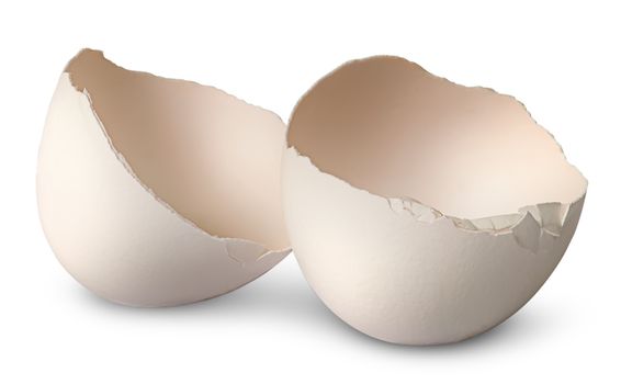 Two halves from crashed egg isolated on white background