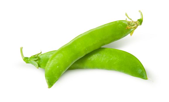 Two of fresh green peas sugar in the pods isolated on white background