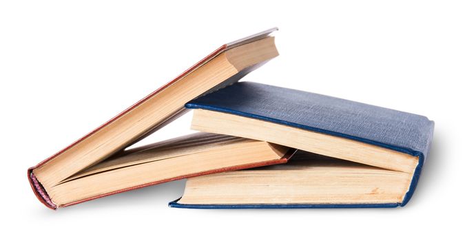 Two old books imbedded in one another rotated isolated on white background