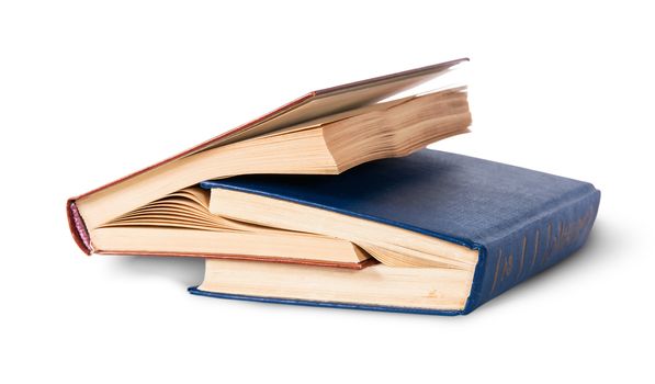 Two old books nested rotated isolated on white background