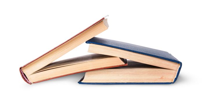 Two old books imbedded in one another isolated on white background