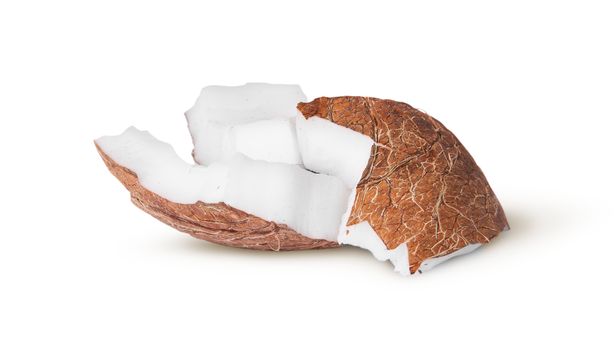 Two pieces of coconut pulp on each other isolated on white background