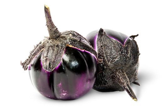 Two round eggplants mature lying near isolated on white background