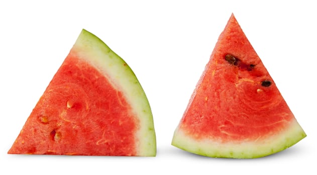 Two red ripe watermelon piece isolated on white background