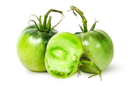 Two whole and half green tomatoes isolated on white background