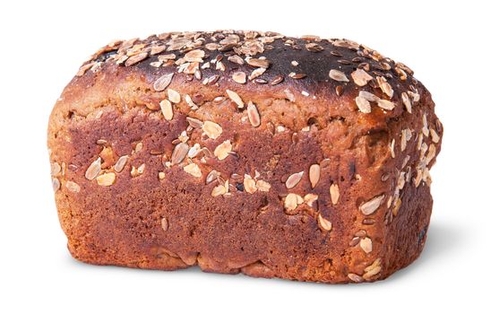 Unleavened black bread with nuts seeds and dried fruit rotated isolated on white background