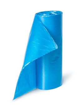 Vertical roll of blue plastic garbage bags isolated on white background