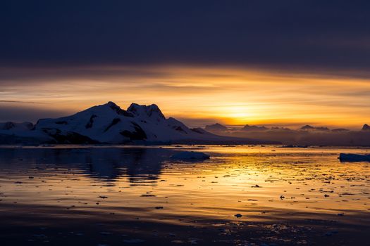 Sunset in the middle of Lemaire Channel, Antarctica