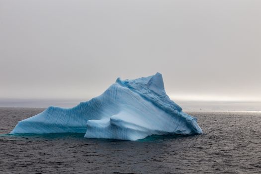 Iceberg drifting at Lemaire Channel, Antarctica