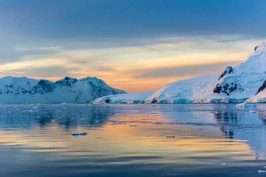 Idyllic lagoon with mountains in the background at the Lemaire Strait, Antarctica