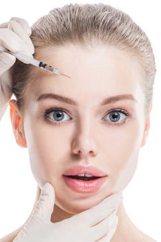Cosmetic injection to female face isolated on white background