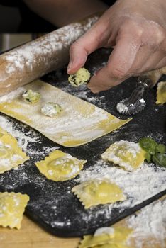 working hard in the kitchen for the family.