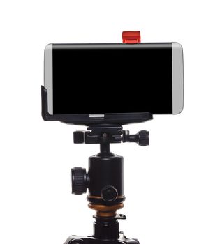 Mobile phone on a tripod, white isolated background