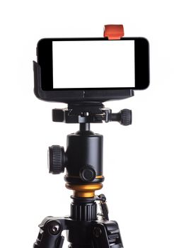 Mobile phone on a tripod, white isolated background