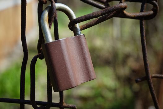 lock key pad on an old metal chain