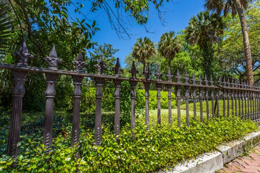 An old ironwork fence in the downtown historic district of Savannah, Georgia.