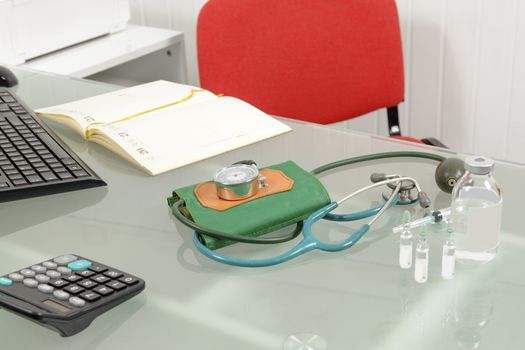 Close up of a sphygmomanometer, the doctor's office on the table ready to control your blood pressure.