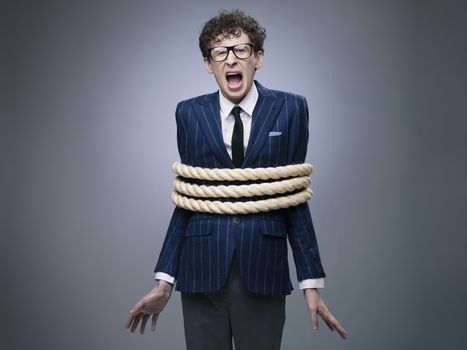 Funny business man tied up with rope screaming for help