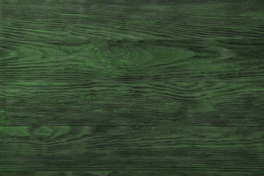 Colorful dark green empty pine wooden background