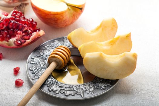 Apples, pomegranate and honey for Rosh Hashanah.