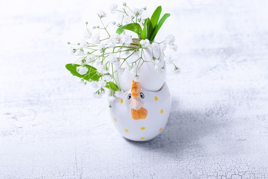 Egg with flowers on a white background. Easter Symbols