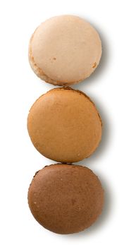 Caramel macarons isolated on a white background