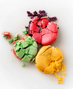 Three squashed macarons isolated on a white background