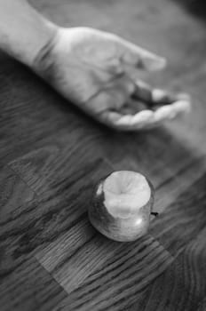 Snow White hand lying on the floor after biting poisoned apple