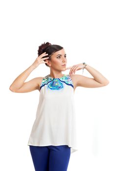 the young woman in convenient clothes on a white background