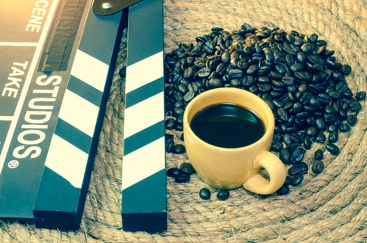 Cup of coffee with slate on a jute rope.
