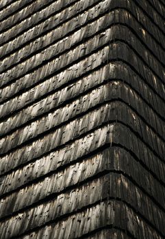 background or texture corner of the house paneling wooden shingles