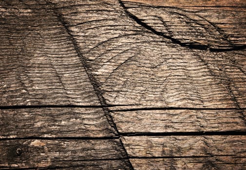 abstract background or texture Old wooden board with notches by sawing