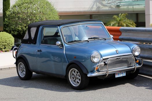 Monte-Carlo, Monaco - May 18, 2016: Blue Retro Car Austin Mini Cooper (Side View) At The City Street in Monaco, French Riviera