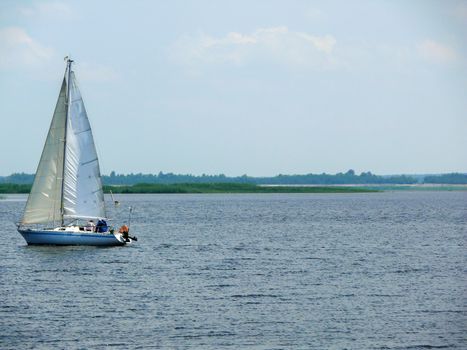 a Sailingboat on a lake at sunny day, Ukraine