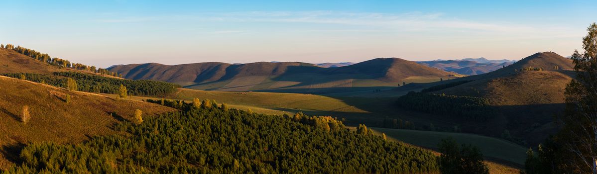 Beauty dawn in the mountains in Altay, panoramic picture