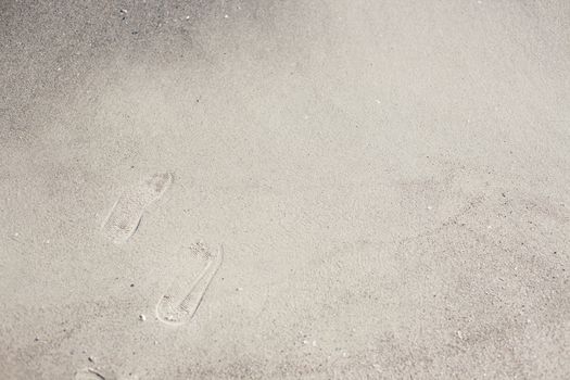 Natural background of sand on the shore of the black sea