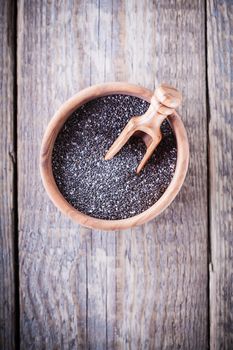 A bunch of Chia Seeds on a wooden table