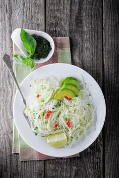 Spicy kohlrabi noodles, dressing: fish sauce, vinegar rices, lime garlic and ginger