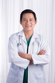 Male Doctor with stethoscope in a hospital