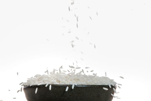 White Rice falling down. Jasmine Rice, Thai Rice, Raw Rice.