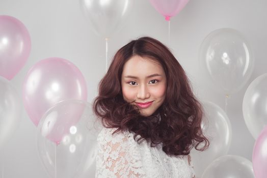 Asian beauty fashion woman with pastel balloons