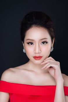 Sensual glamour portrait of beautiful asian woman model lady with red lips color and clean healthy skin face