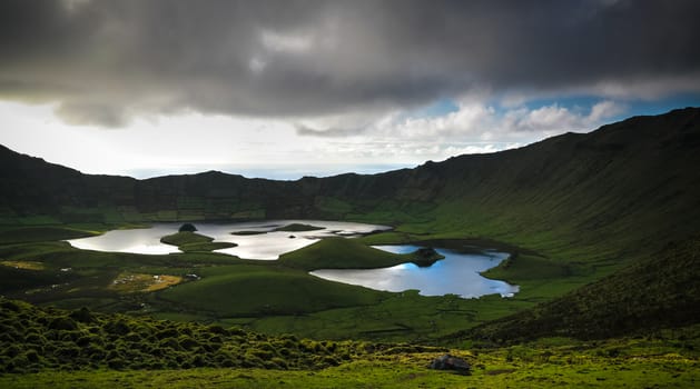 Landscape sunset view to Caldeirao crater at Corvo island, Azores, Portugal